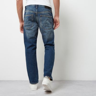 Blue wash distressed loose fit Cody jeans